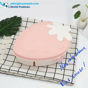 イチゴの形のキャンディーとメロンの種の容器