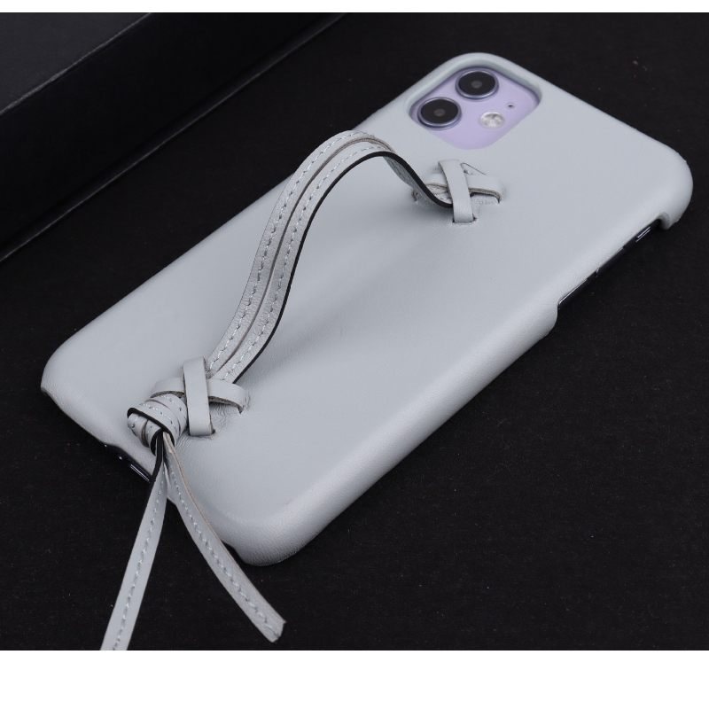 新しいアップルiPhone 15ミニマリストソリッドカラー本革の電話ケースは、フルレザーストラップキャリングケースと360度フルラップアンチフォールと衝突電話ケースを特徴としています